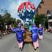 A red, white and blue themed float is guided down E. Liberty St. by members of the Detroit Parade Company during the 23rd Annual Ann Arbor Jaycees Fourth of July Parade on Thursday, July 4, 2013 on South State Street in downtown Ann Arbor. Melanie Maxwell | AnnArbor.com